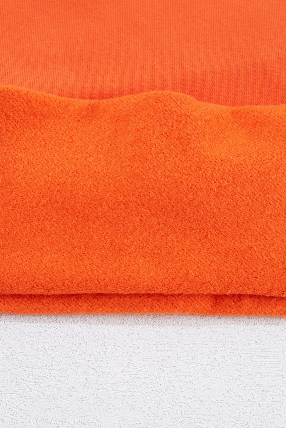 Einfarbiges Frottee-Sweatshirt mit überschnittener Schulter und Fleecefutter in Rotorange