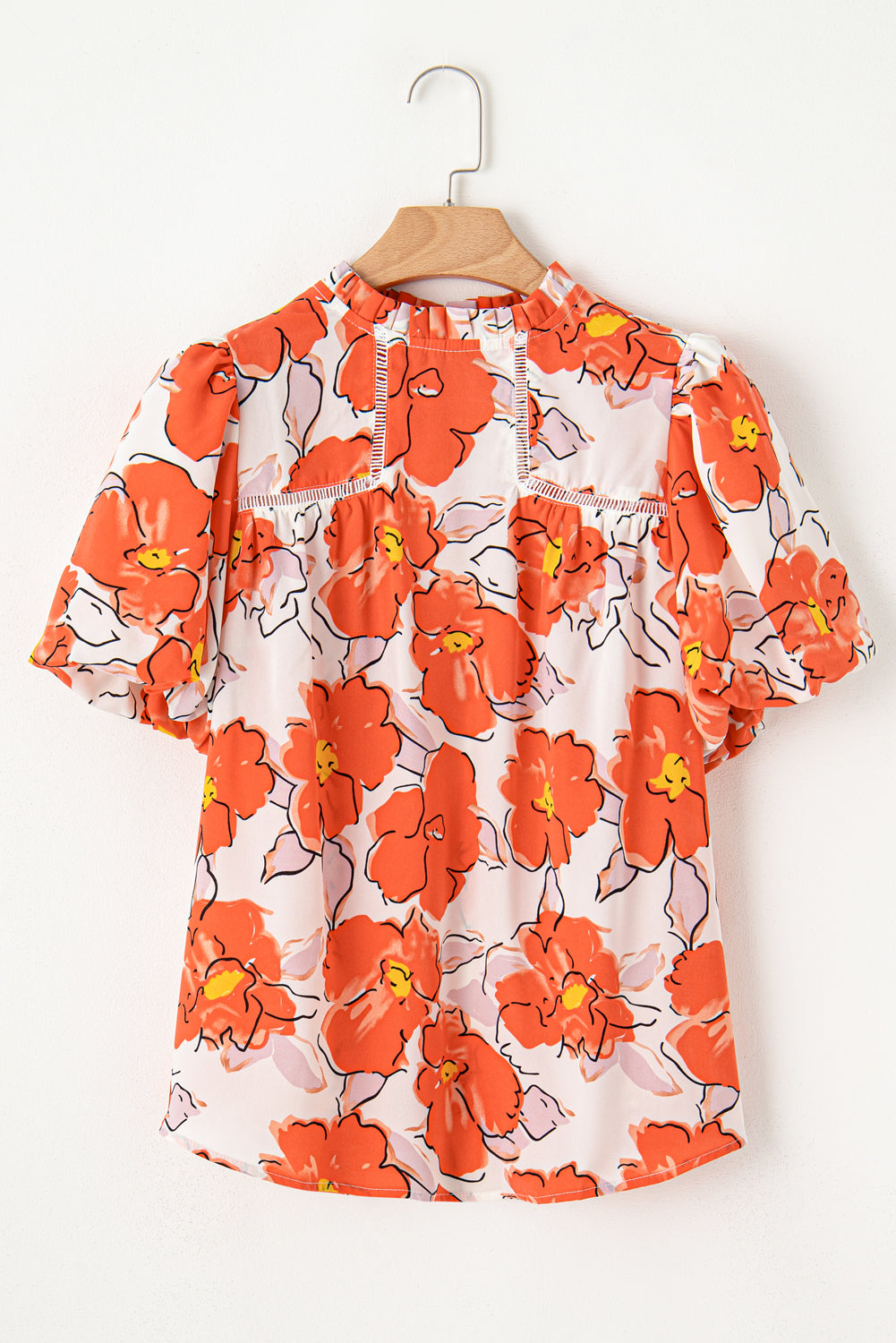 Orangefarbene Bluse mit Blumenmuster, Puffärmeln und Rüschenkragen