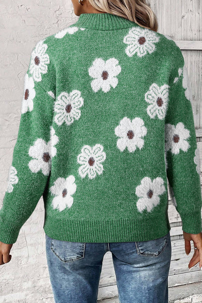 Grüner Pullover mit Blumenmuster und halblangem Reißverschluss sowie überschnittenen Schultern