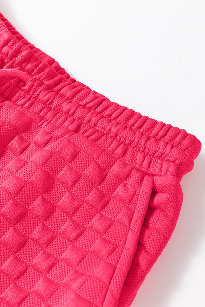 Erdbeerrosa kariertes, strukturiertes Pullover-Oberteil und Hose-Set mit Schlitz