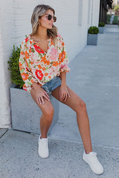 Orangefarbene Bluse mit Puffärmeln und Rüschenbesatz