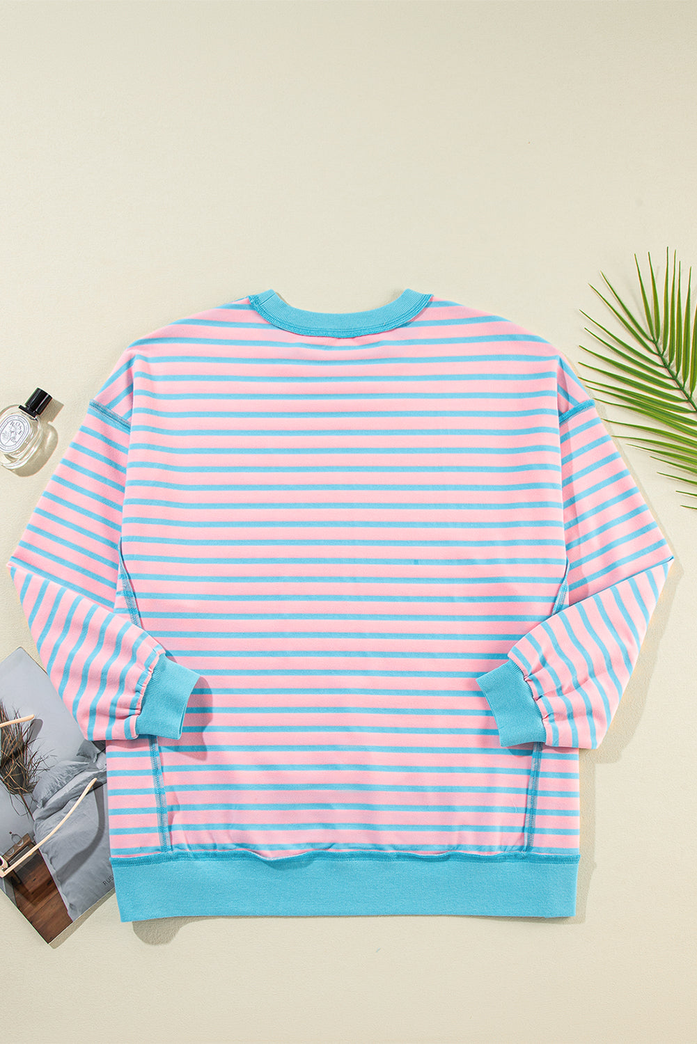 Rosa gestreiftes High-Low-Pullover-Tunika-Sweatshirt mit Kontrastbesatz