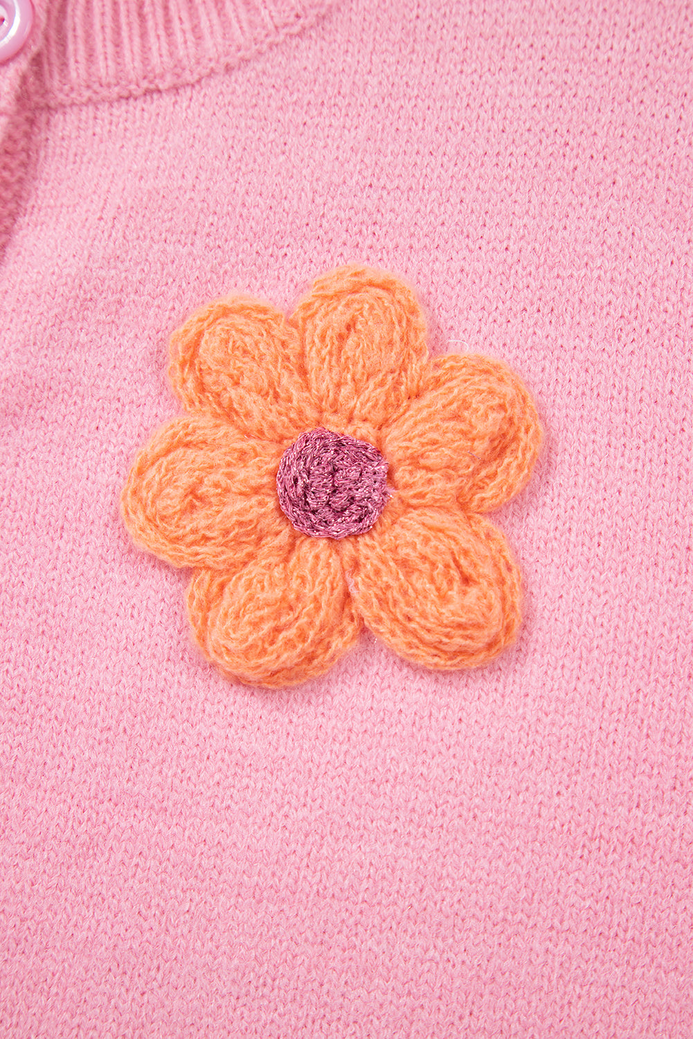 Niedliche Strickjacke mit Blumenmuster in Rosa