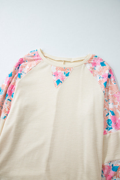 Apricot – Geripptes Oberteil mit Blumen-Patchwork und Puffärmeln in Übergröße