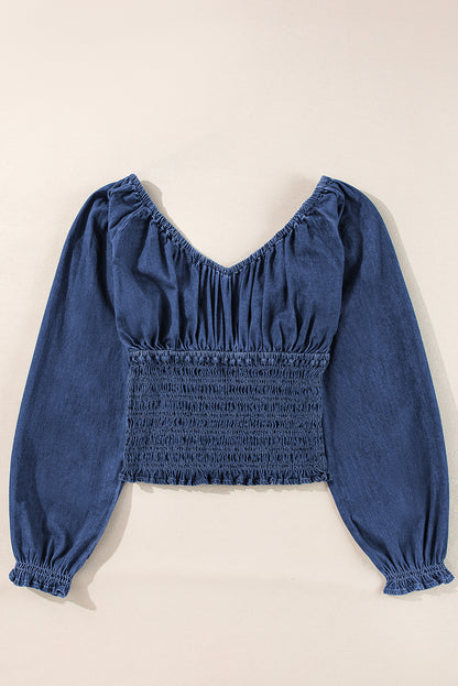 Dunkelblaue Jeansbluse mit gesmokten Rüschen und Puffärmeln sowie V-Ausschnitt