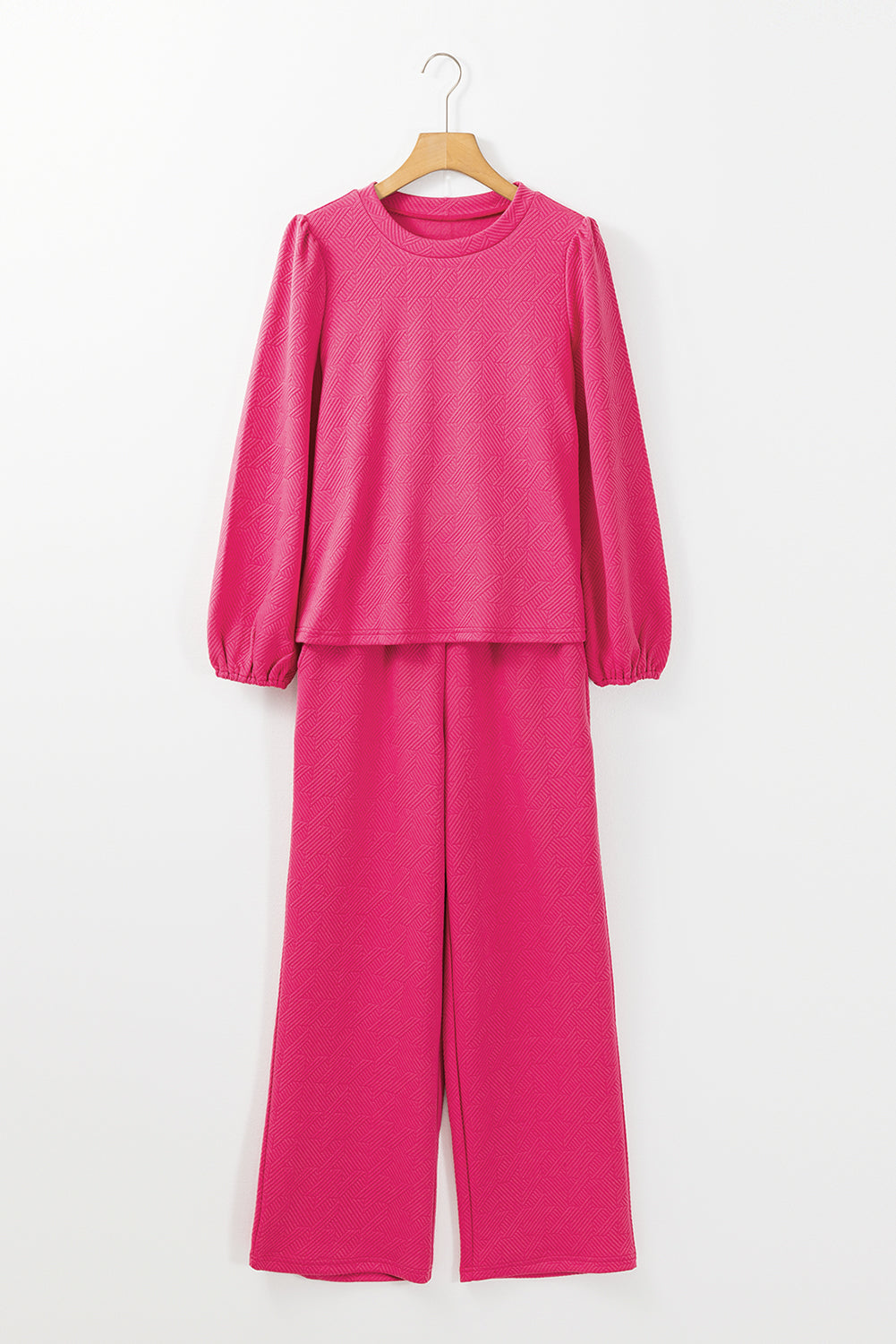 Rosarotes Set aus strukturiertem Oberteil und Hose mit Puffärmeln