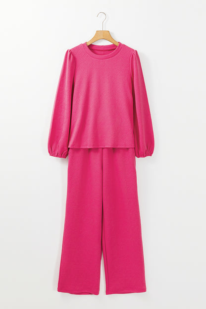 Rosarotes Set aus strukturiertem Oberteil und Hose mit Puffärmeln