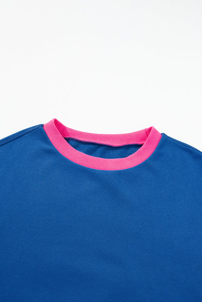 Blaues Sweatshirt mit Farbblock-Muster und Puffärmeln