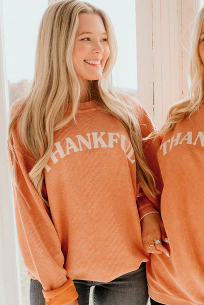 Oranges Sweatshirt mit THANKFUL-Buchstabengrafik