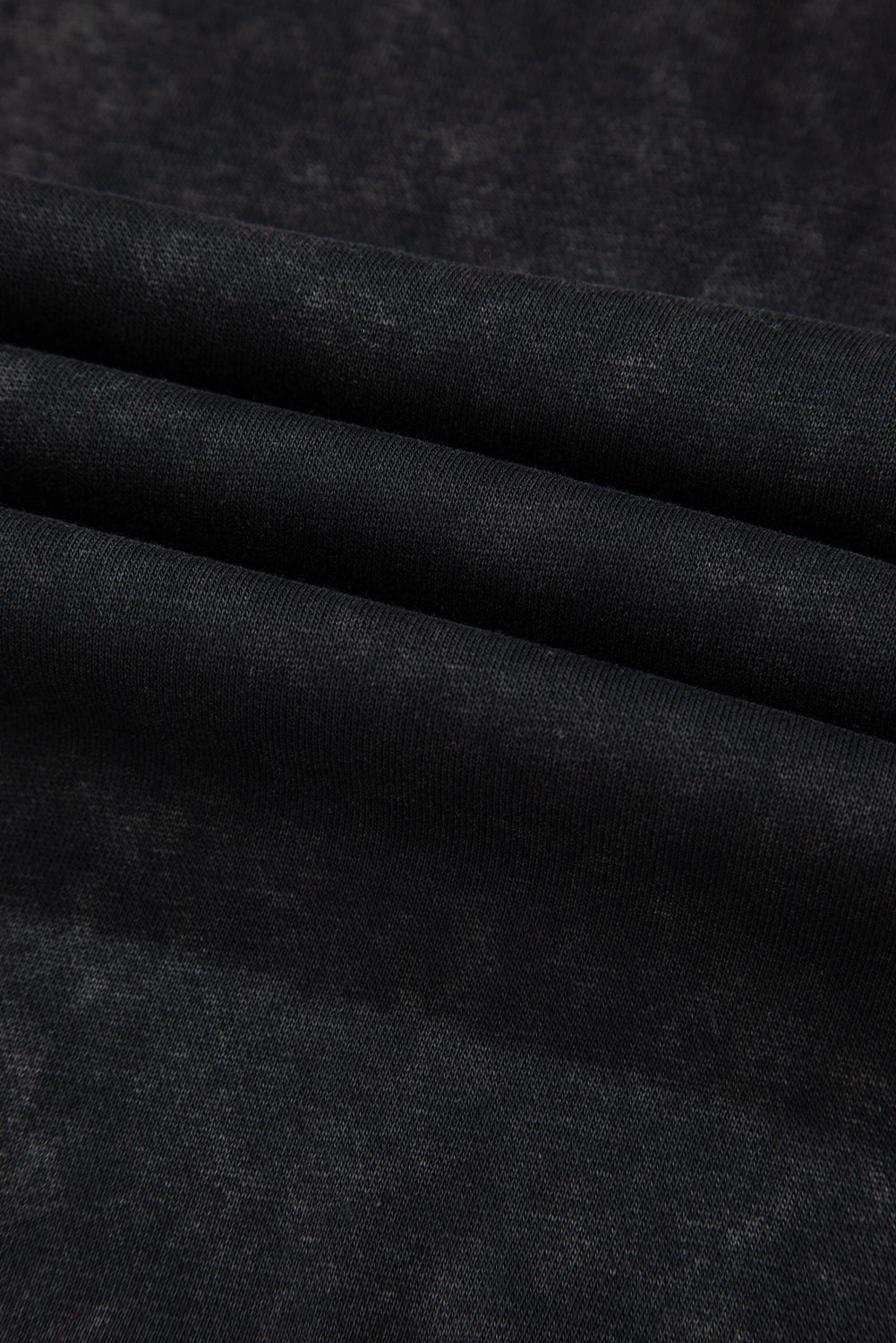 Schwarzes Sweatshirt mit Raglanärmeln und Waffelstrick-Patchworkmuster