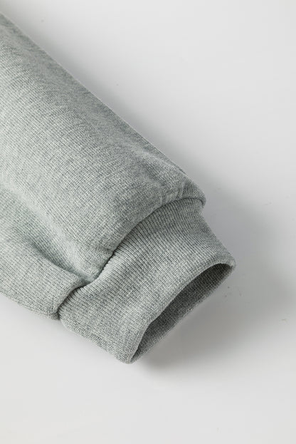 Mittelgraues Oversize-Oberteil mit seitlichem Schlitz und überschnittener Schulter