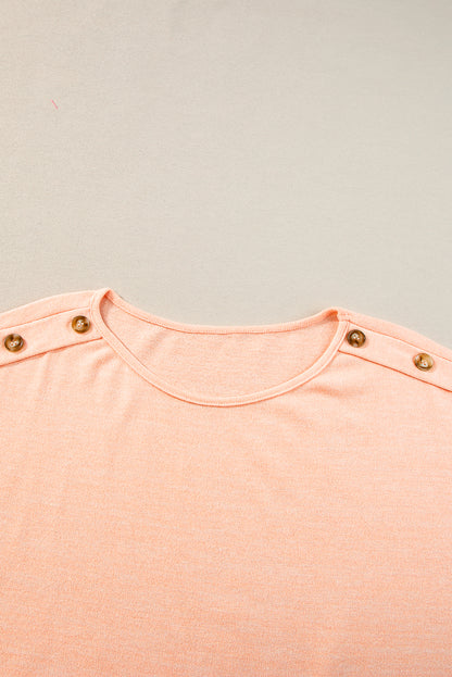 Aprikosenrosa Lässiges T-Shirt mit Fledermausärmeln und Knopfdetail