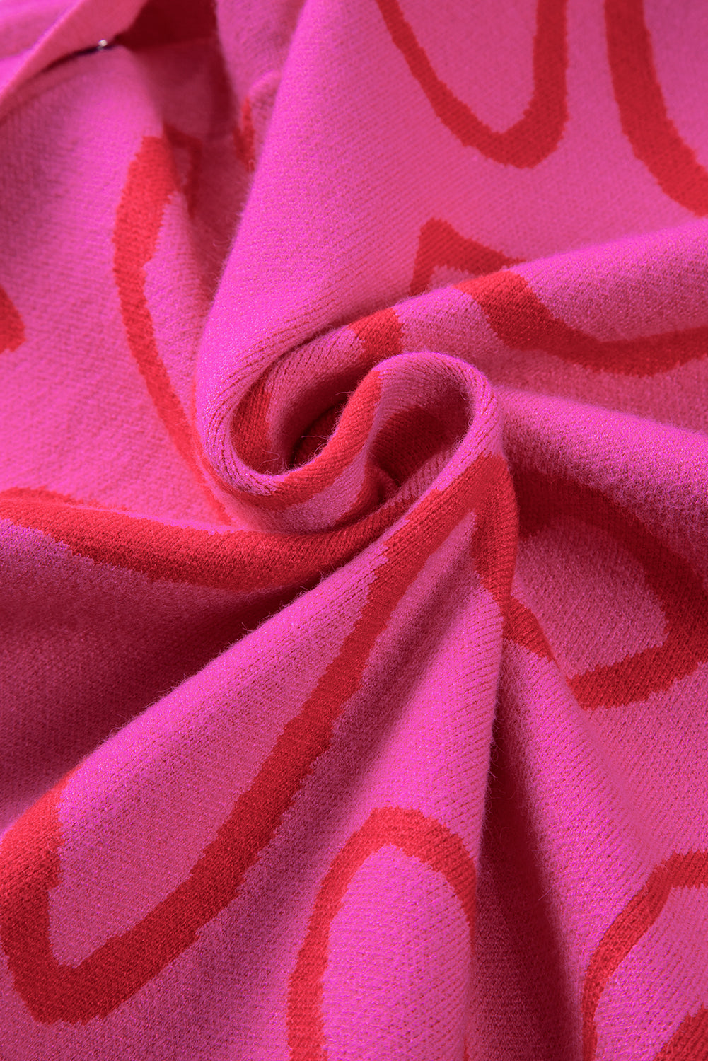 Ärmelloses Stricktop mit Blumenmuster und Knopfleiste in leuchtendem Pink