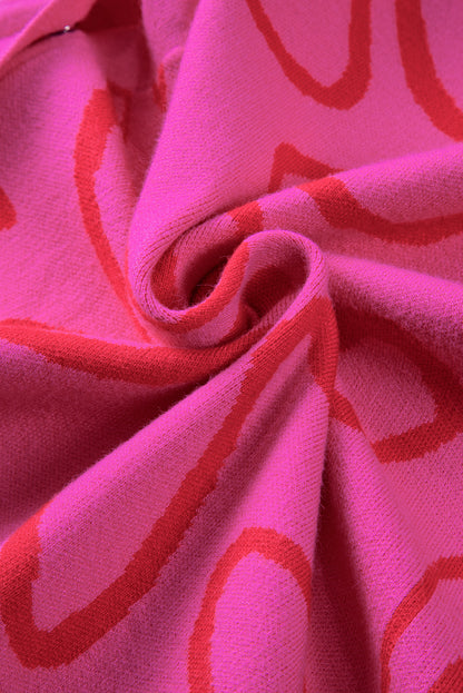 Ärmelloses Stricktop mit Blumenmuster und Knopfleiste in leuchtendem Pink