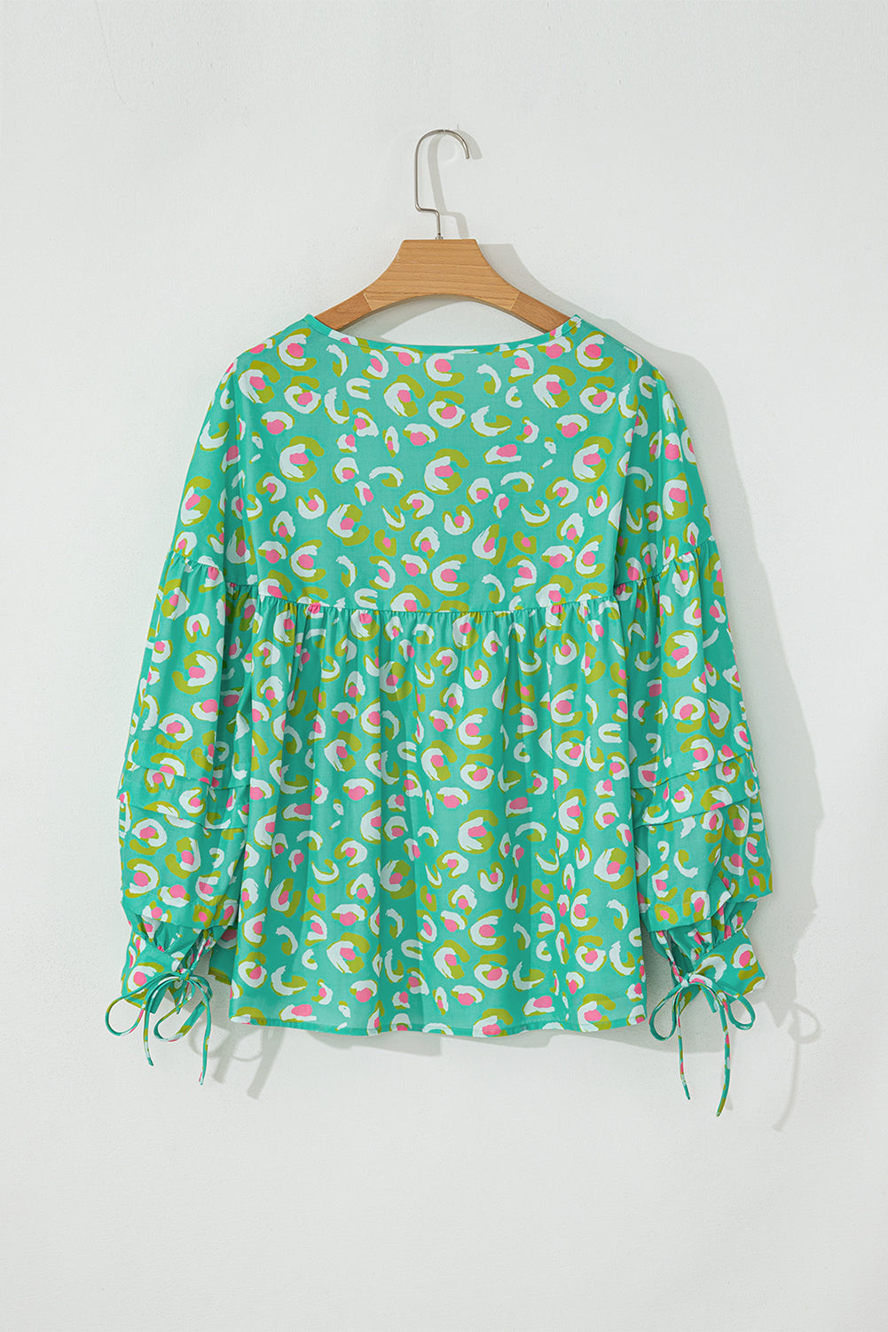 Grüne Babydoll-Bluse mit abstraktem Print und Schnürung und Laternenärmeln
