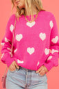 Hellrosa Pullover mit flauschigen Valentinstagsherzen und überschnittener Schulter