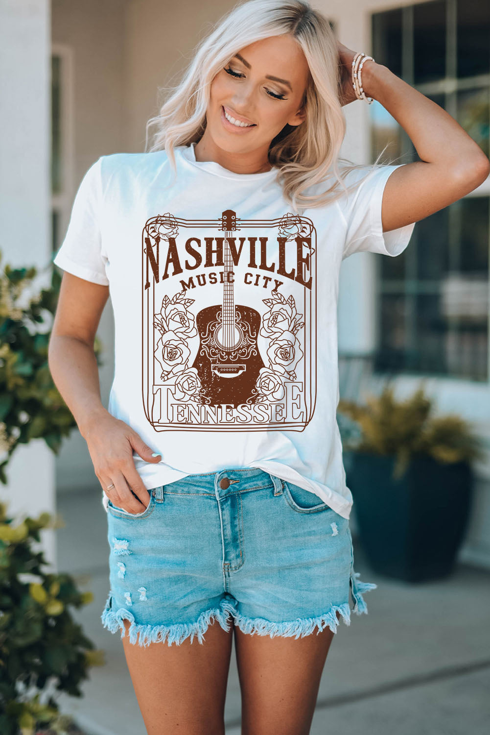 Weißes T-Shirt mit Rundhalsausschnitt und Grafik „NASHVILLE MUSIC CITY“