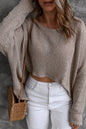Grauer, lässiger Pullover mit Dolman-Ärmeln und hohem Bund
