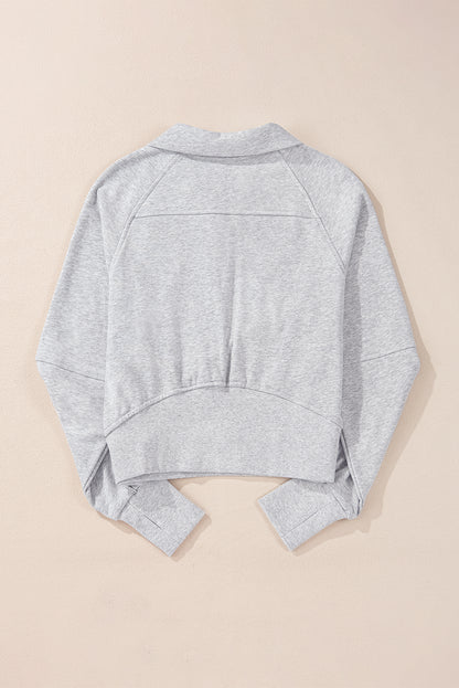 Hellgraues Sweatshirt mit Viertelreißverschluss, Stehkragen und Kängurutasche