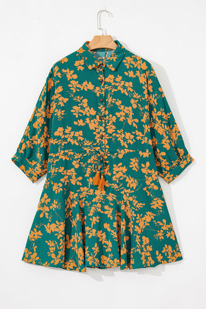 Grünes, fließendes, kurzes Tunika-Kleid mit Blumenmuster und Kordelzug