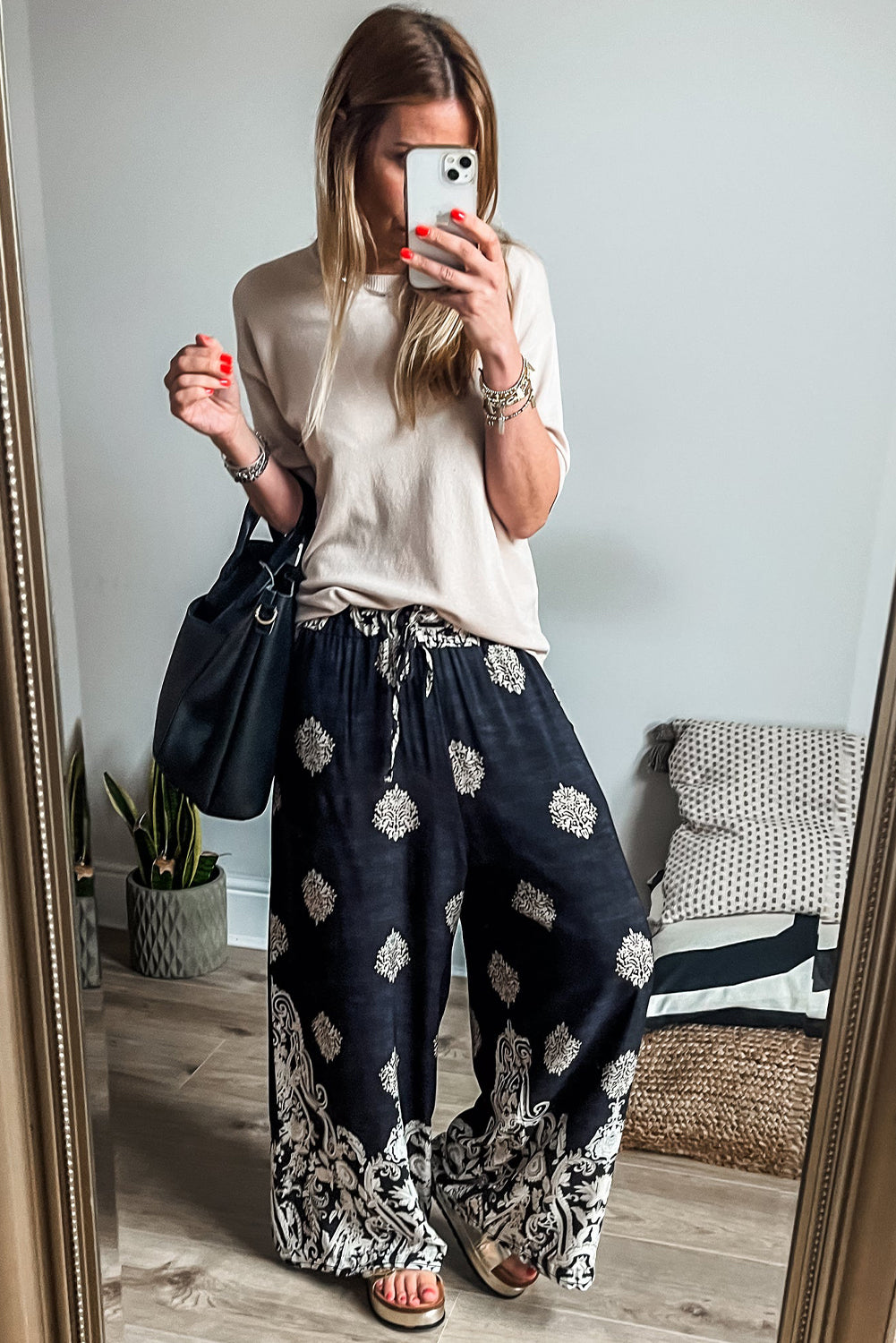 Schwarze Hose mit weitem Bein und Bohemien-Print
