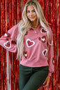 Rosa Sweatshirt mit Pailletten und Herz-Druckknöpfen in Mineralwaschung und Kragen