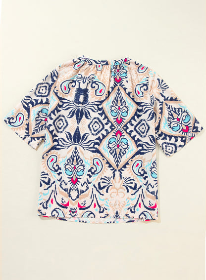 Weiße Bluse mit abstraktem Print und V-Ausschnitt, geschlitzten Halbarm