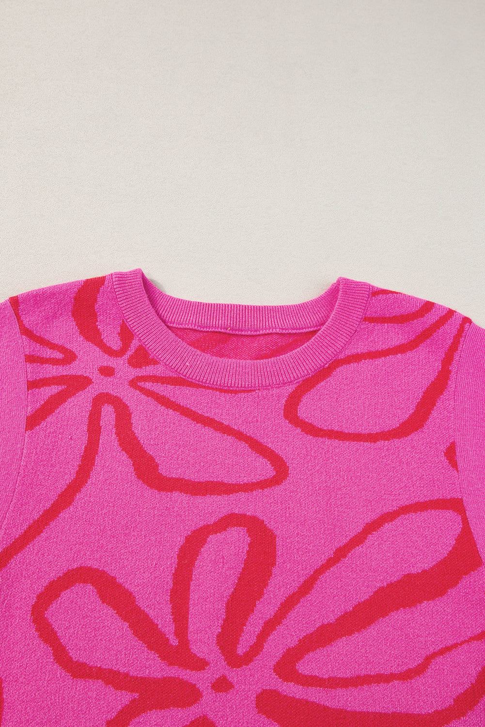 Ärmelloses Stricktop mit Blumenmuster und Knopfleiste in leuchtendem Pink