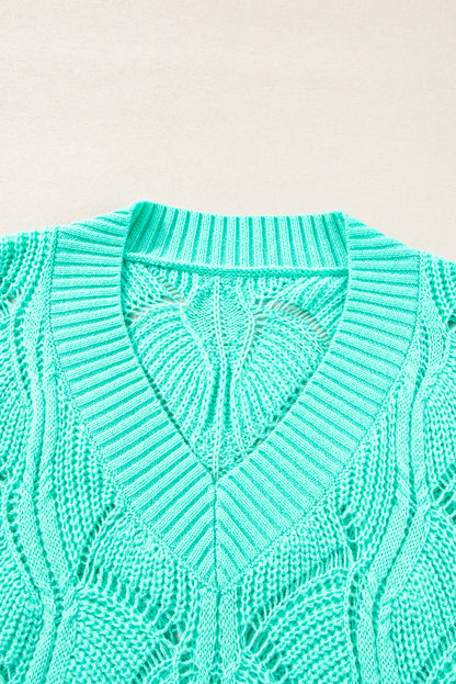 Mintgrüner Strickpullover mit V-Ausschnitt und überschnittenen Schultern