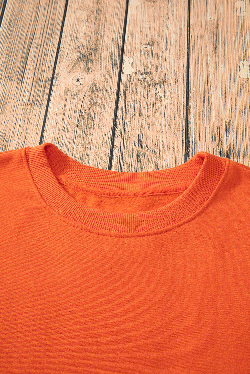 Einfarbiges Frottee-Sweatshirt mit überschnittener Schulter und Fleecefutter in Rotorange