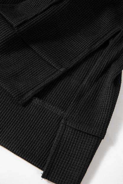 Schwarzer, übergroßer Kapuzenpullover mit Waffelstrick und Fleecefutter