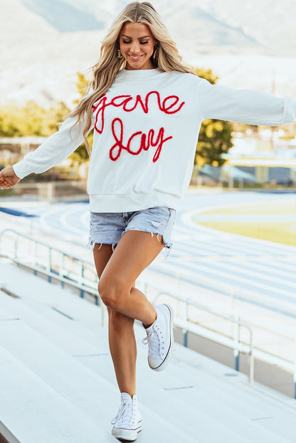 Weißes Lametta-Sweatshirt mit Game Day-Grafik und überschnittener Schulter