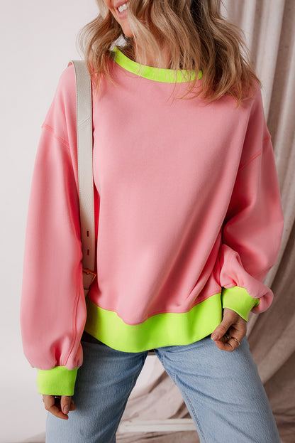 Rosa Sweatshirt mit Farbblock-Muster und Puffärmeln