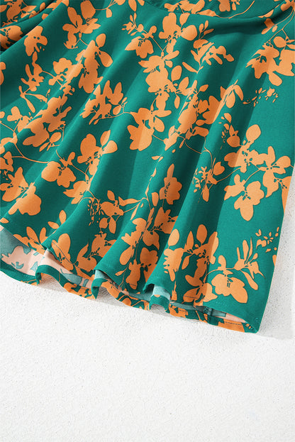 Grünes, fließendes, kurzes Tunika-Kleid mit Blumenmuster und Kordelzug