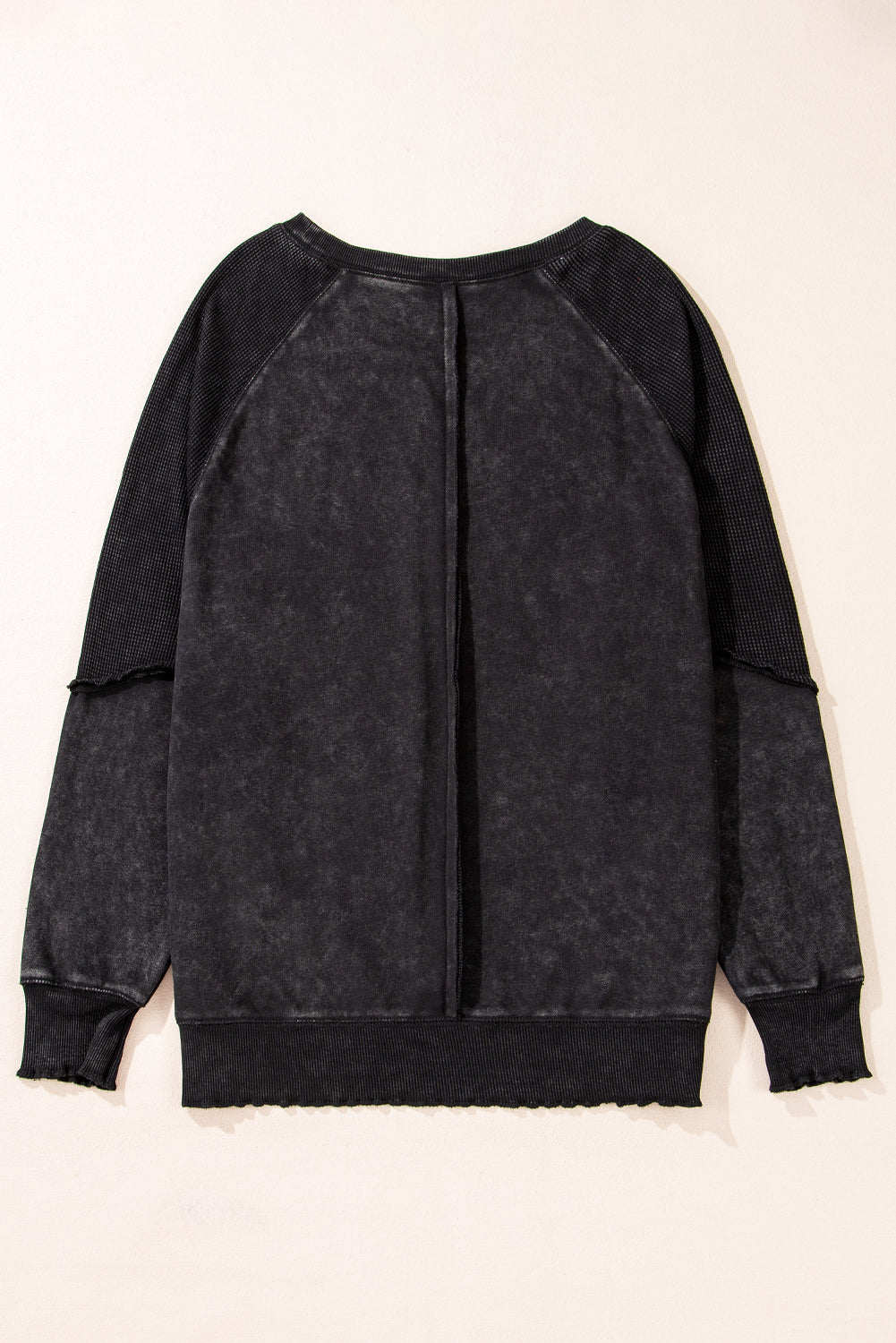 Schwarzes Sweatshirt mit Raglanärmeln und Waffelstrick-Patchworkmuster
