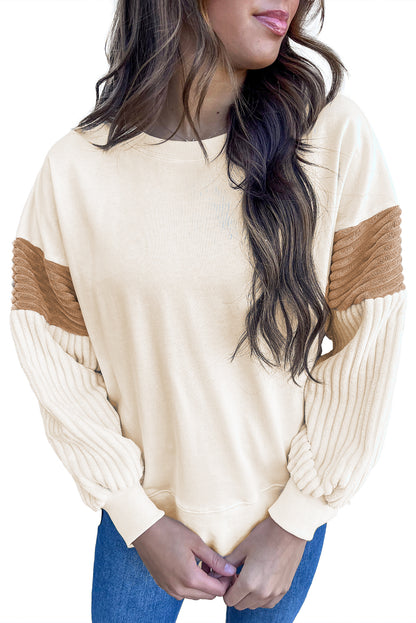 Aprikosenfarbenes Cord-Patchwork-Langarm-Sweatshirt mit überschnittener Schulter
