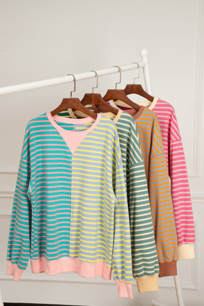 Rosa gestreiftes, lässiges, gestreiftes Colorblock-Sweatshirt mit überschnittener Schulter