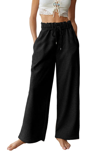Schwarze, elastische Jogginghose mit hoher Taille und Kordelzug
