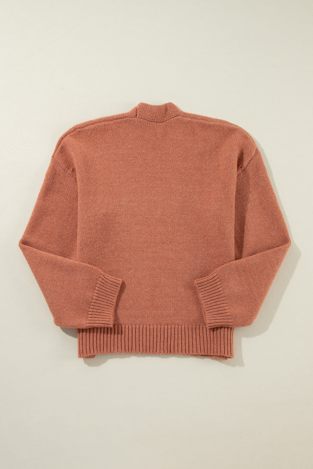 Kurzer Cardigan mit überschnittenen Schultern und offener Vorderseite in Hellbeige