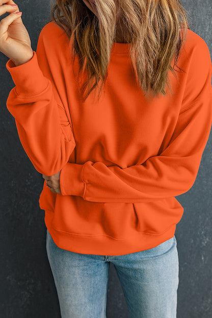 Orangefarbenes, einfarbiges, klassisches Sweatshirt mit Rundhalsausschnitt