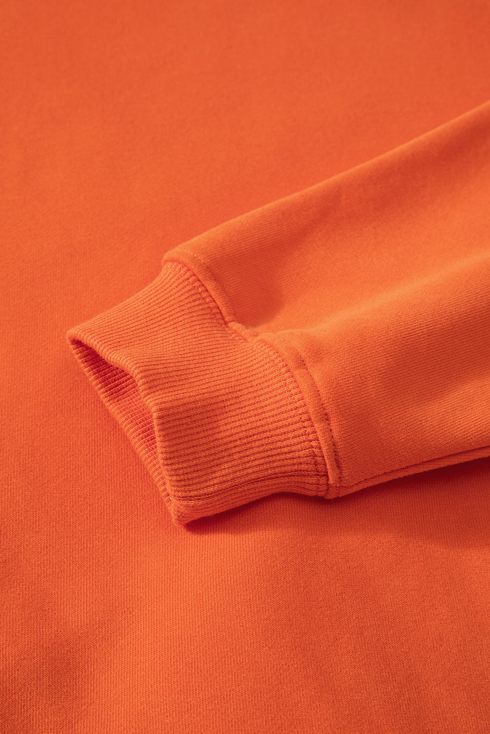 Einfarbiges Frottee-Sweatshirt mit überschnittener Schulter und Fleecefutter in Rotorange
