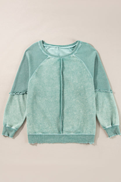 Mineralblaues, einfarbiges Sweatshirt mit Waffelstrick und Patchwork-Raglanärmeln