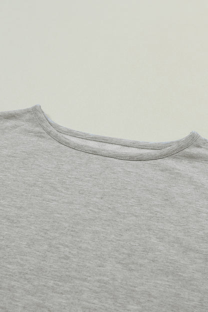 Graue Oversize-Bluse mit Crinkle-Spleißen und offenem Saum, High Low