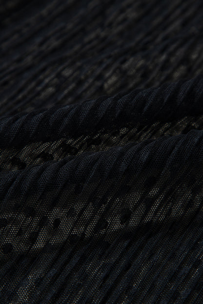 Schwarze Bluse mit transparenter Spitze und Stehkragen und langen Ärmeln