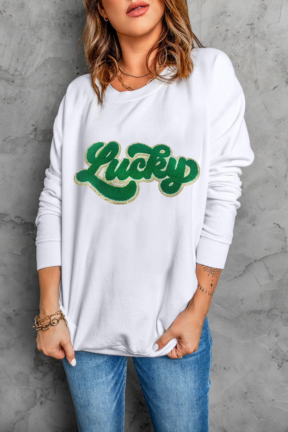 Weißes Chenille-Sweatshirt mit glänzendem Besatz und Glücksmuster
