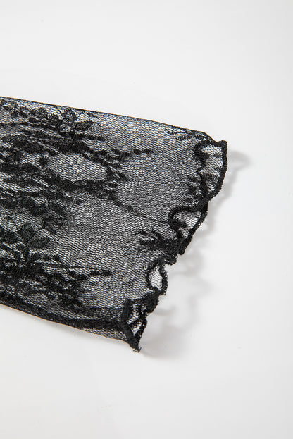Schwarze, schmal geschnittene Langarmbluse mit Häkel-Spleißen und Spitzennetz