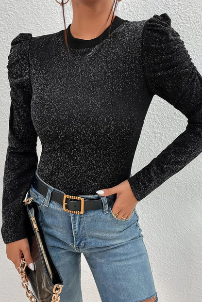 Schwarzes, schmal geschnittenes Strickoberteil mit Gigot-Ärmeln in Metallic-Optik