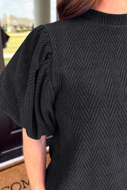 Schwarze Bluse mit Stehkragen und Puffärmeln