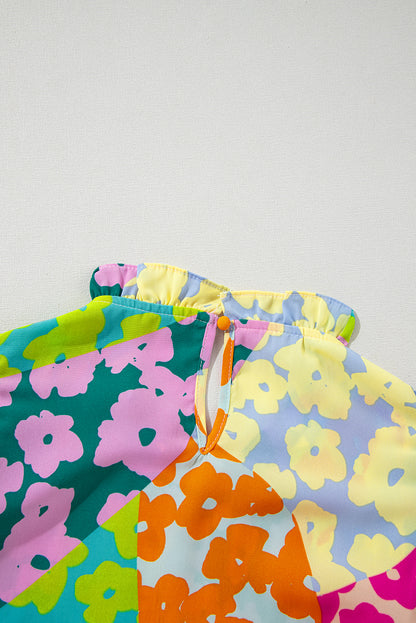 Mehrfarbige Bluse mit abstraktem Print und plissierten Flügelärmeln