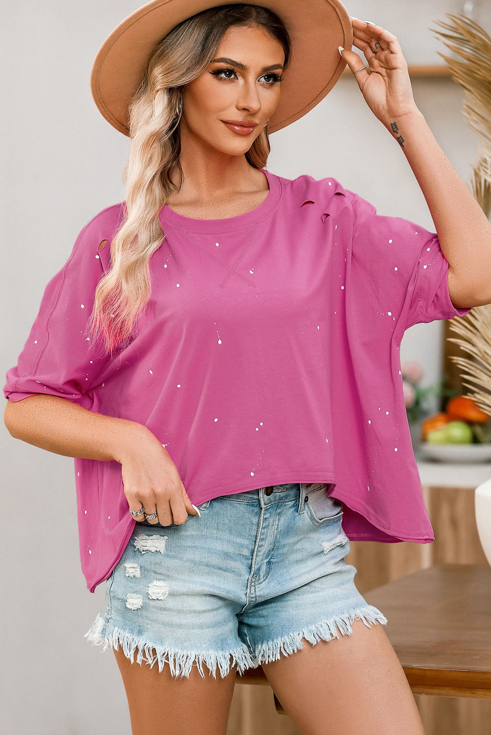 Rosa, gebleichtes Top mit asymmetrischem Saum im Used-Look und kurzen Ärmeln